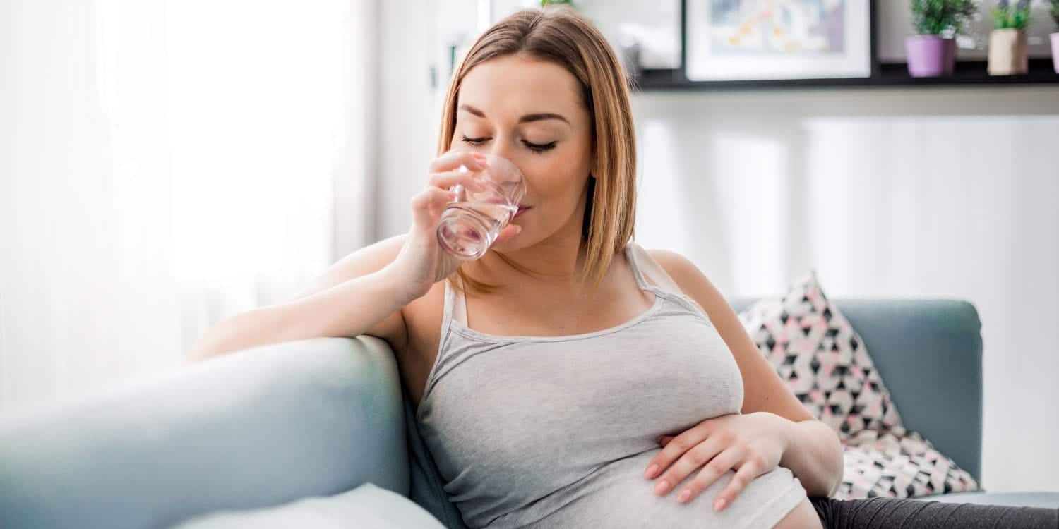 Pregnant Woman Drinking Water